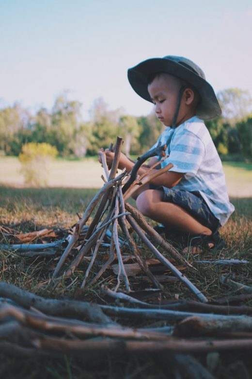 child playing loose parts play