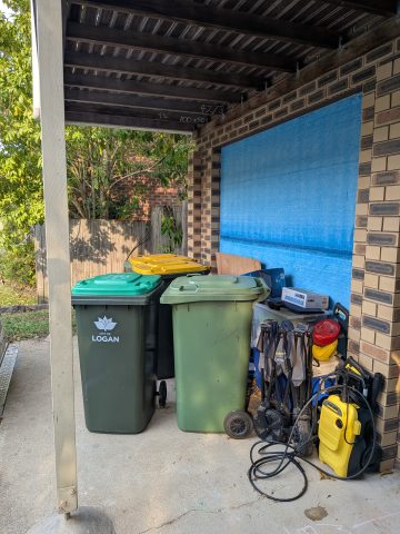 rubbish bins at front door