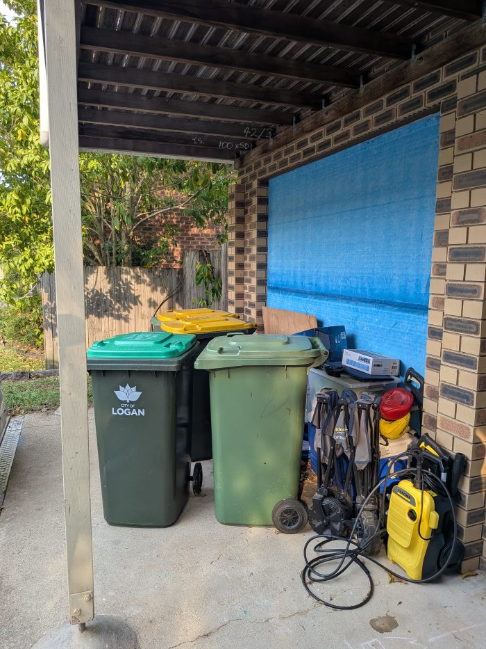 rubbish bins at front door